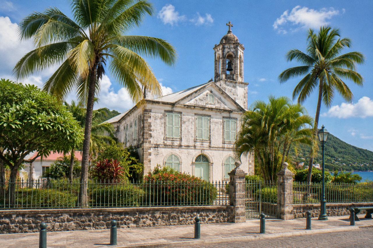White church presbytery with green shutters in sunny Caribbean town square