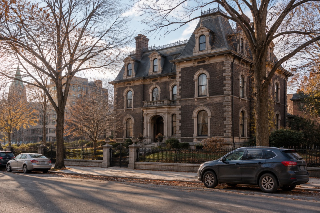Historic brick mansion facade on a downtown Hamilton street in autumn light